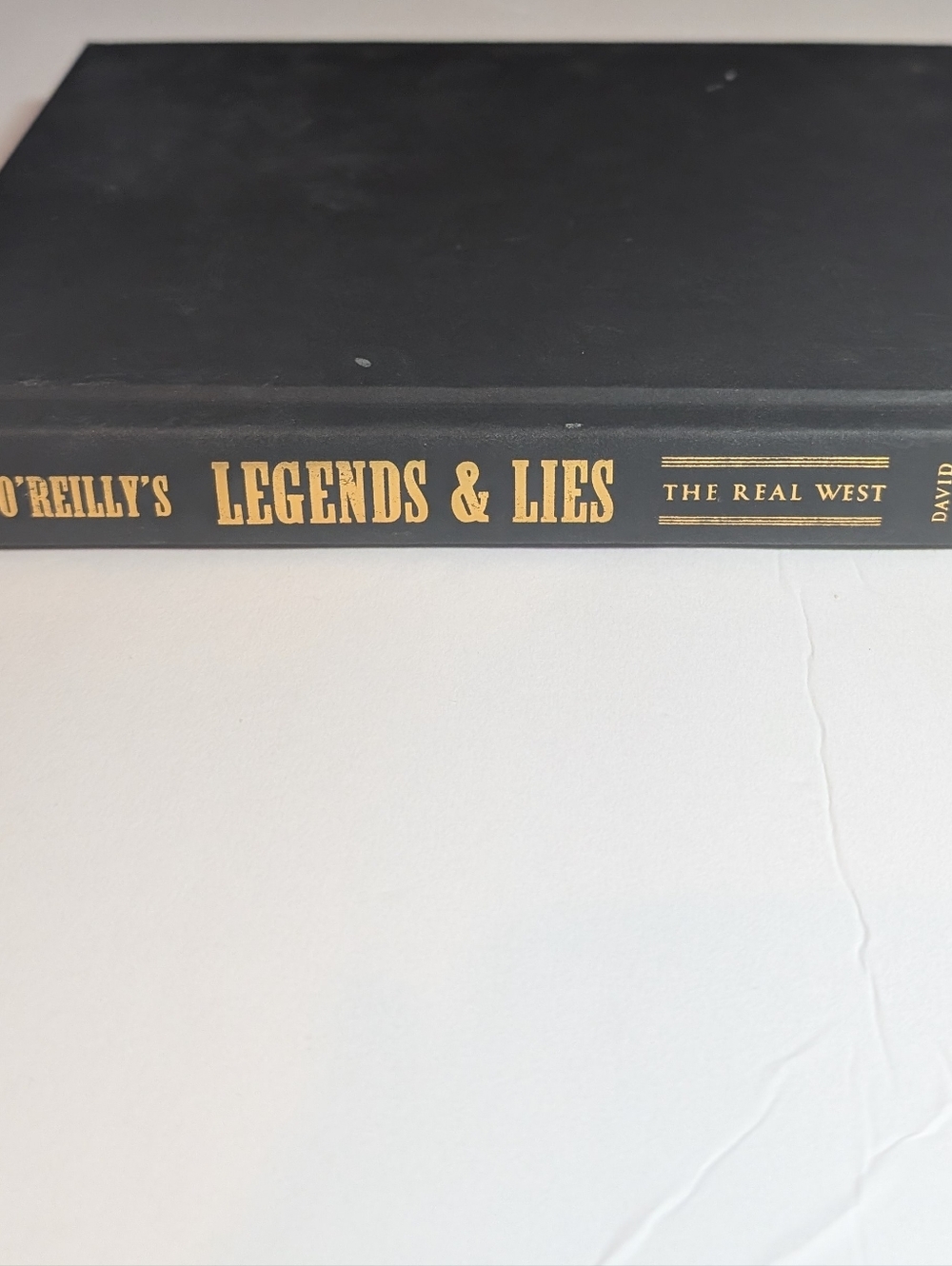 Bill O'Reilly's Legends & Lies: The Real West Hardcover Book - Black & Gold